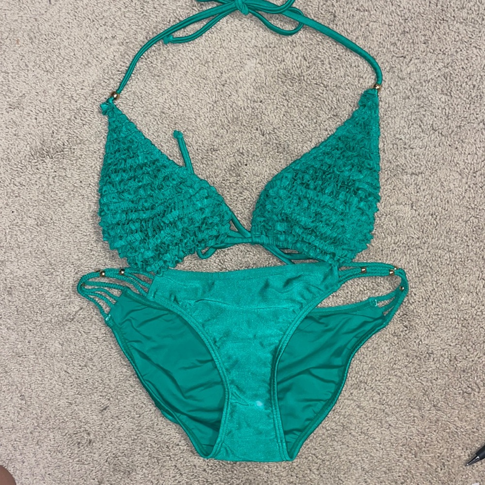 PILY Q Bikini   Top is size large. Bottom size small